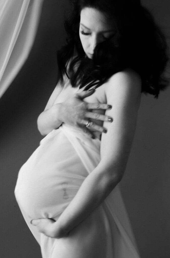Fine art maternity boudoir session in Richmond, Virginia.